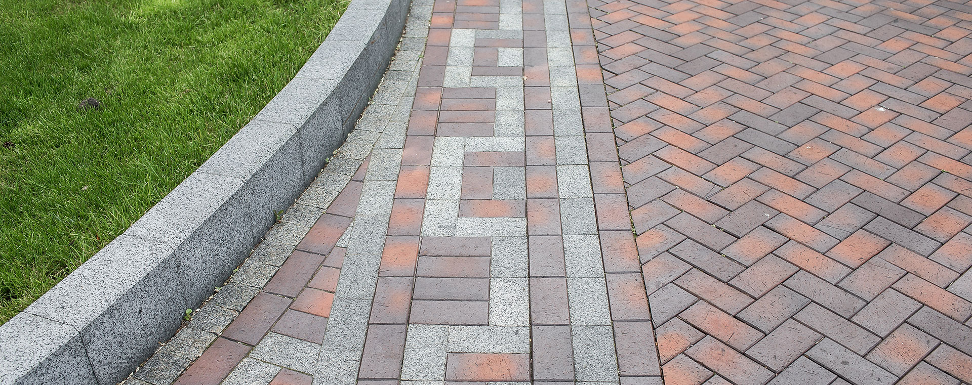 Unlock the Secrets to a Pristine Paver Driveway: A Comprehensive Cleaning Guide